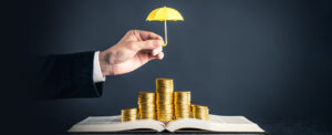umbrella protecting gold coins